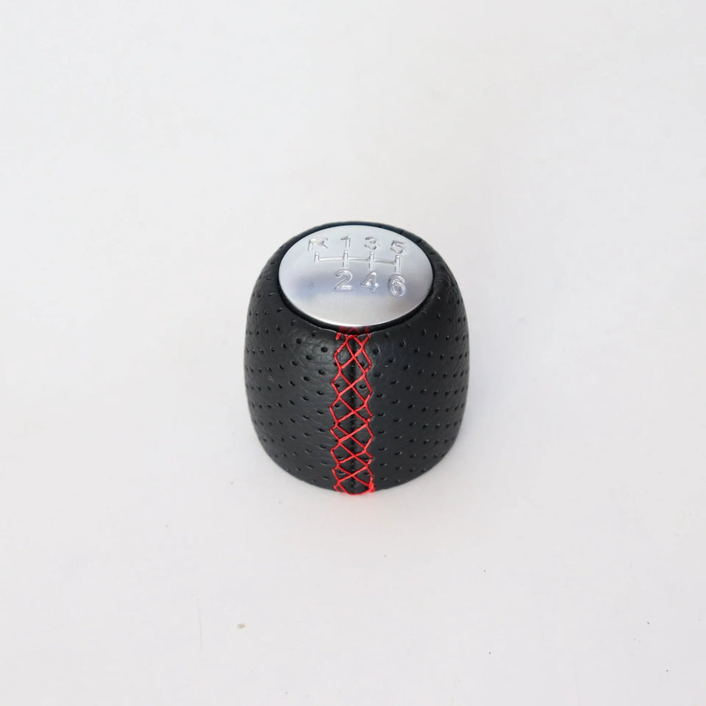Alpha vehicle leather perforated handball gear in black, red, and white colour options