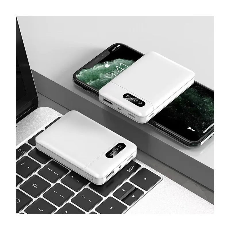 Black and white portable power bank charger with multiple USB ports and compact rectangular design