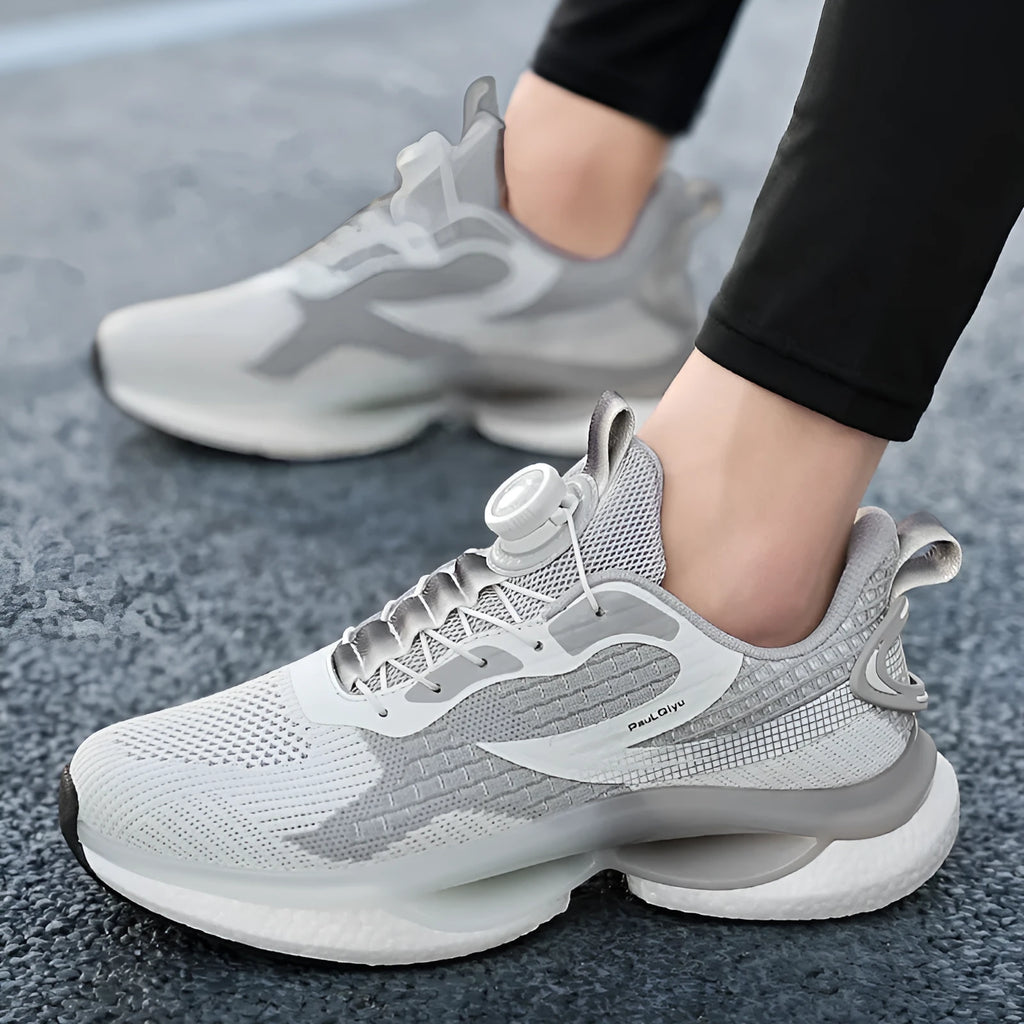 Men's white running shoes with rotating button closure and breathable mesh upper in low-top Korean style design