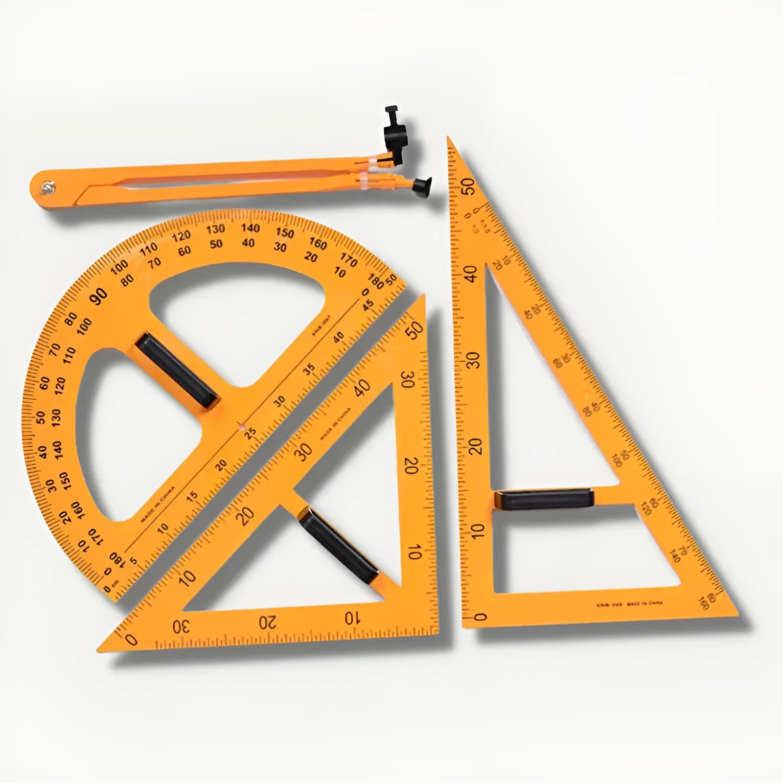 Orange and black plastic triangle ruler and protractor set with chalk compass for mathematics teaching