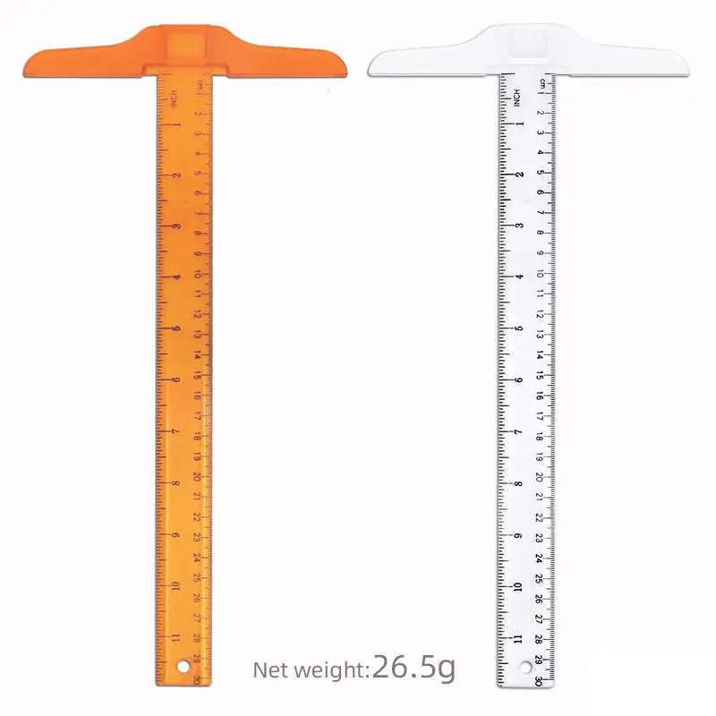 Transparent T-shaped plastic ruler with measurement scales for technical drawing