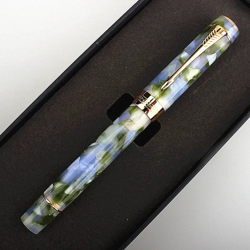 Deep bath green metal ballpoint pen with three removable tips: fine, medium, and graphic.