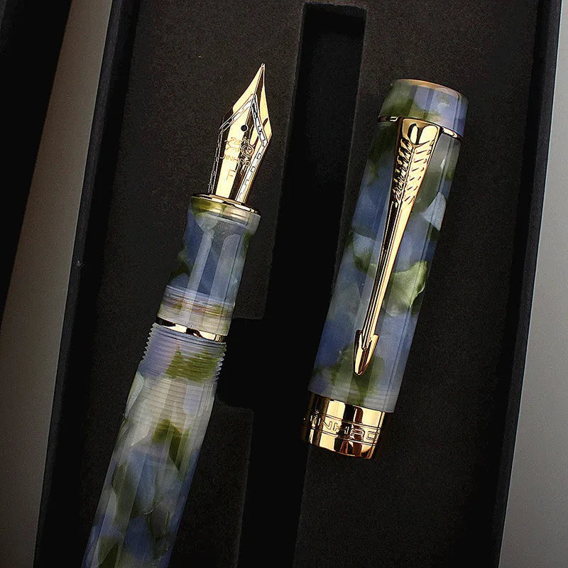 Deep bath green metal ballpoint pen with three removable tips: fine, medium, and graphic.