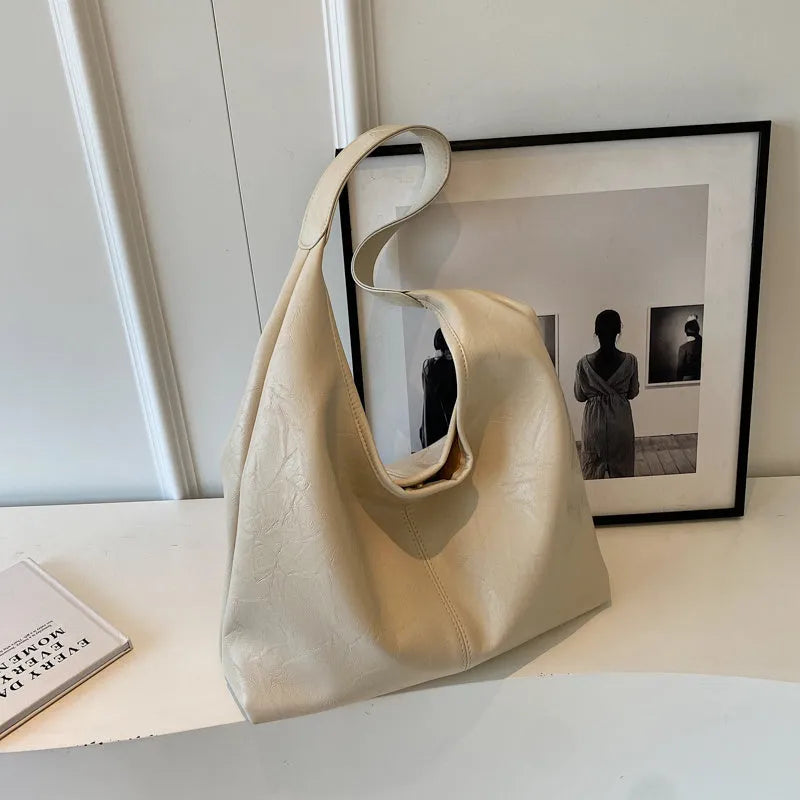 Casual soft leather shoulder bag with large capacity and sandwich pocket design