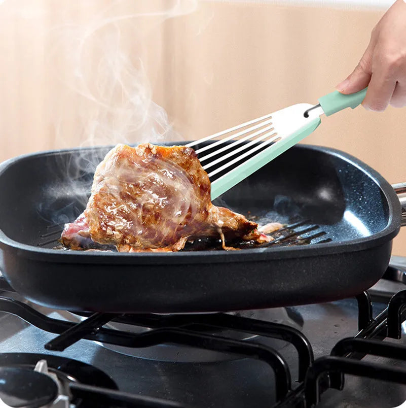 Nonstick fish spatula with thin 1mm slotted blade, silicone edge, and stainless steel core in green or yellow