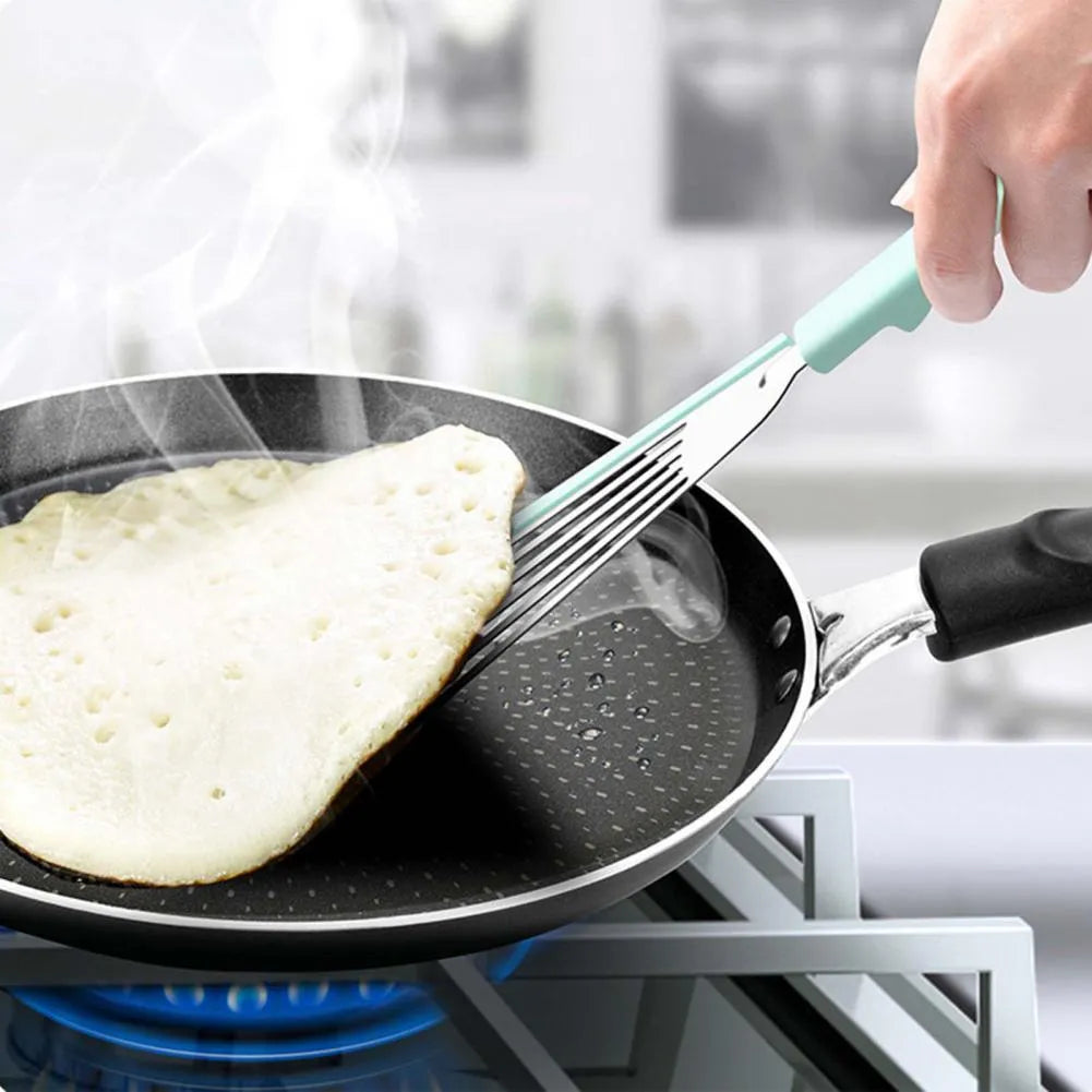 Nonstick fish spatula with thin 1mm slotted blade, silicone edge, and stainless steel core in green or yellow