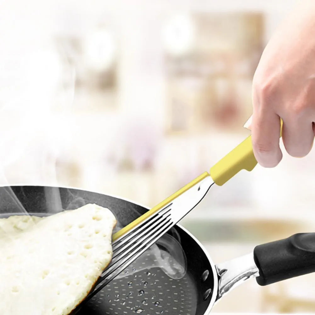 Nonstick fish spatula with thin 1mm slotted blade, silicone edge, and stainless steel core in green or yellow