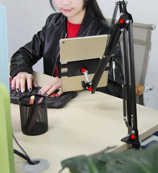 Black and white adjustable phone and tablet stand on desktop showing viewing angle