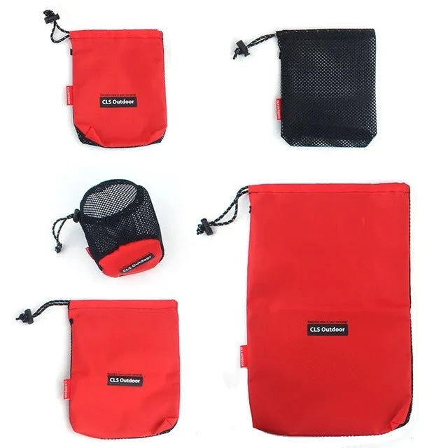 Five red Oxford cloth storage bags with mesh panels and zipper closures for travel organisation