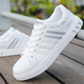 Sports shoes in black, grey, or white colours showing size options 39-44 with foot length measurements