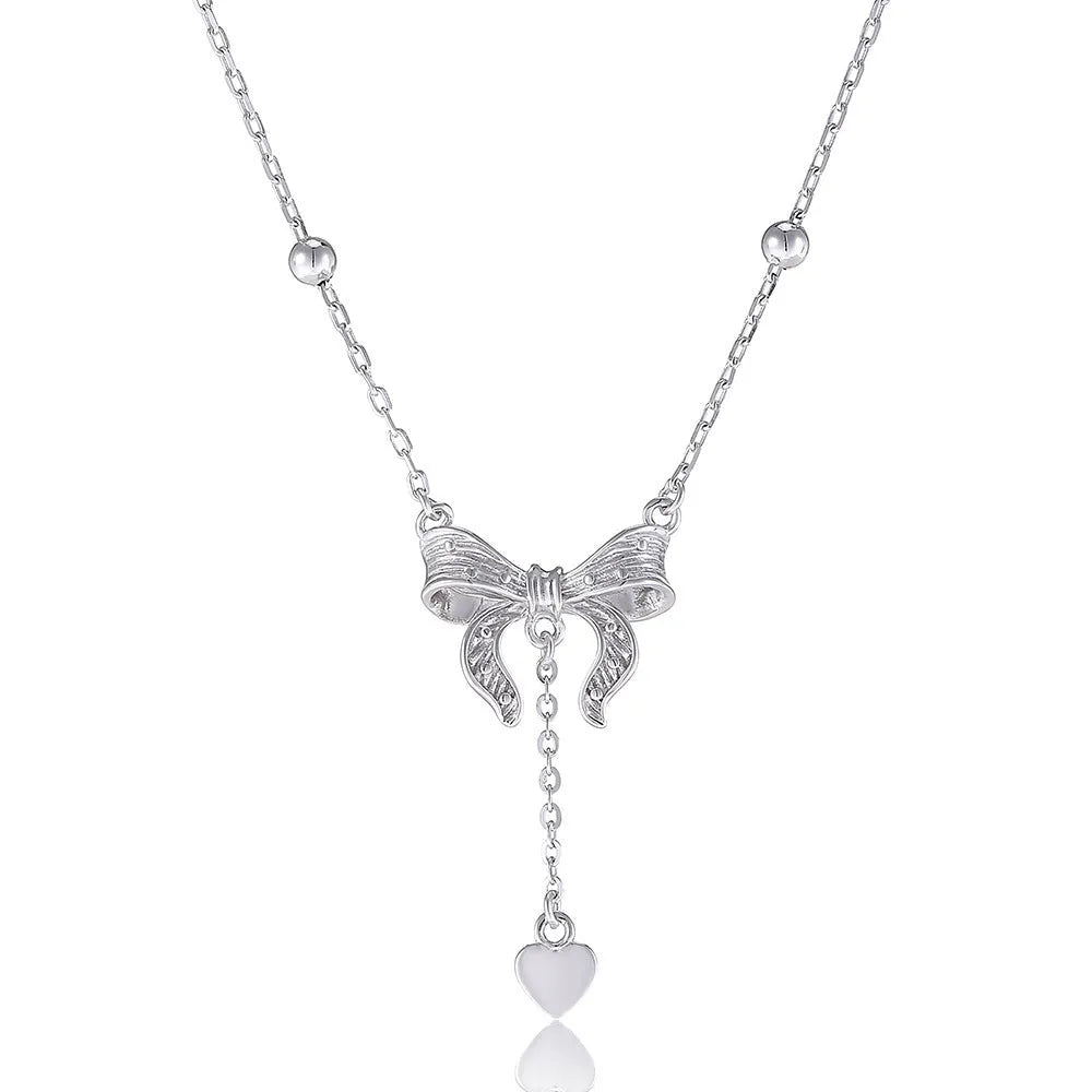 S925 pure silver butterfly and heart-shaped pendant on a silver O-ring clavicle chain.