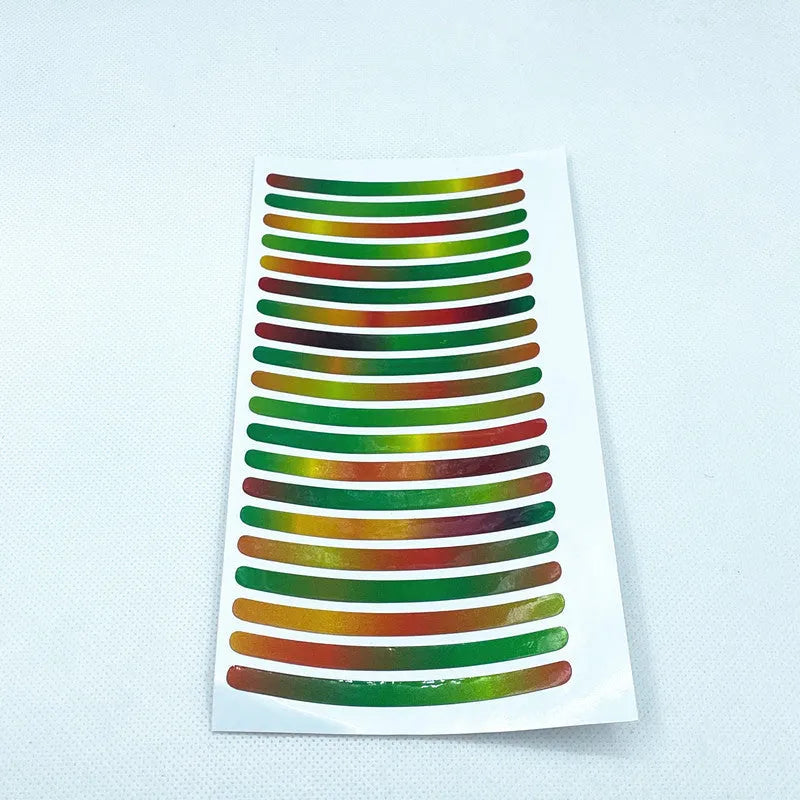 Pack of 20 self-adhesive fluorescent and luminous reflective stickers for car wheel hubs and tyre rims.
