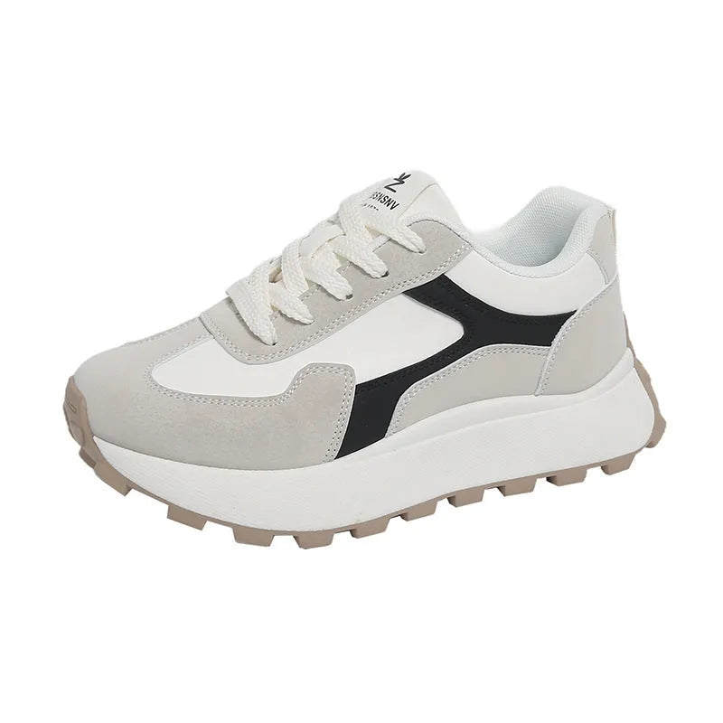Women's solid colour low-top platform sports shoes with lace-up front and rubber sole.