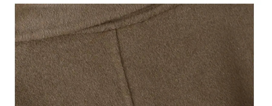 Men's long black wool coat with a suit collar laid flat.