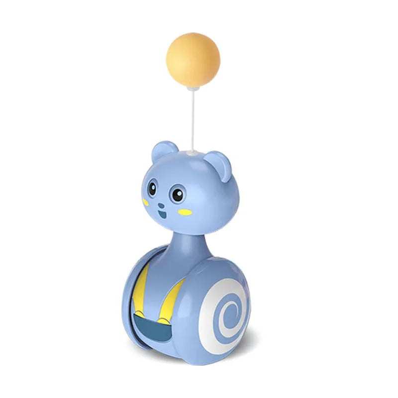 Interactive cat toy with rotating tumbler base and feather wand attachment in blue colour
