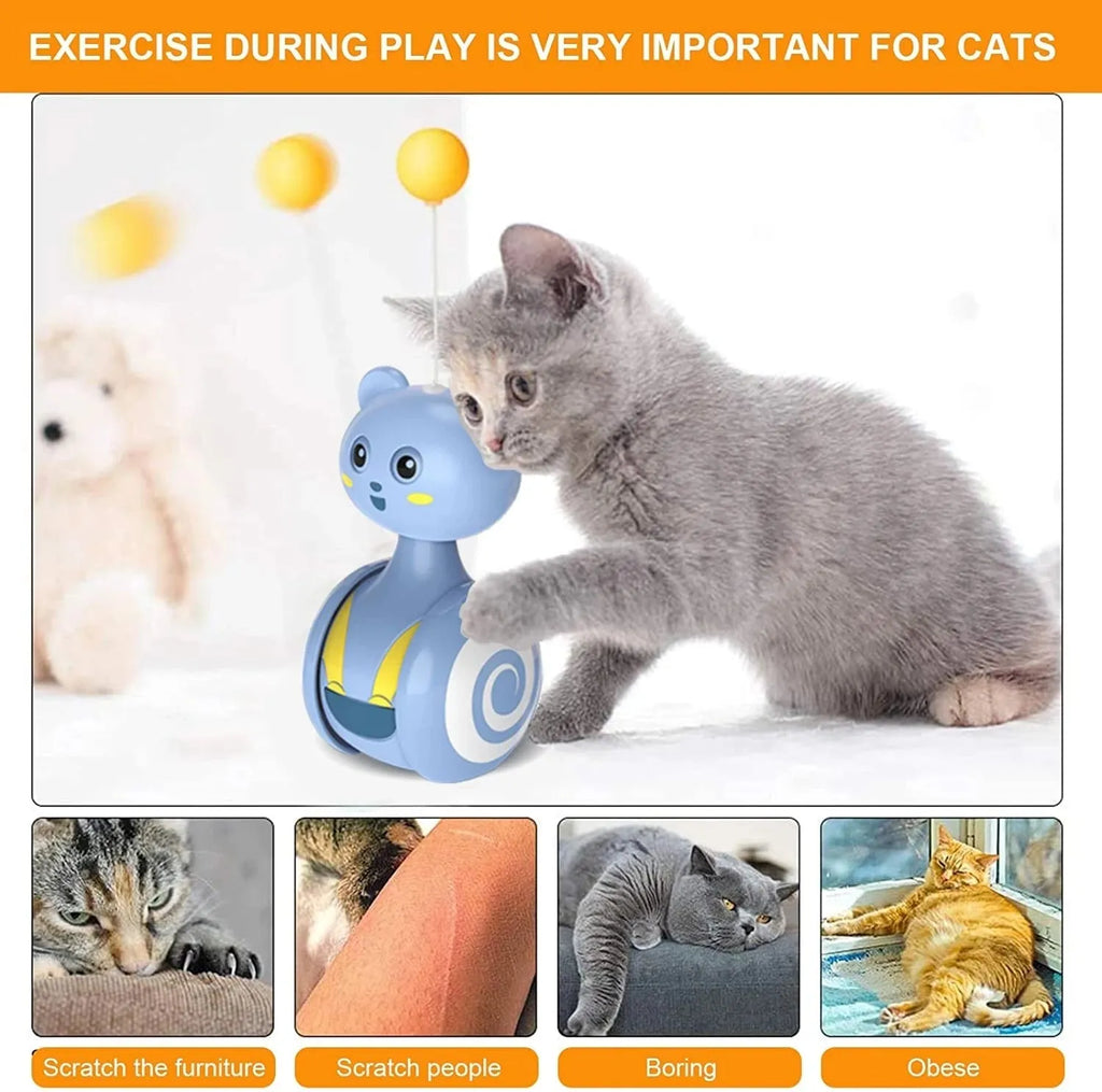 Interactive cat toy with rotating tumbler base and feather wand attachment in blue colour