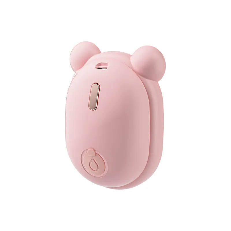 Pink rechargeable pet grooming brush with spray bottle attachment and removable silicone comb head