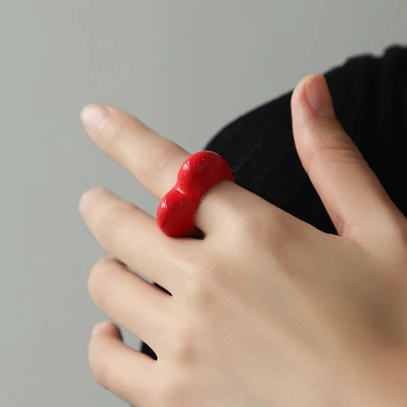 Heart-shaped zinc alloy ring with three-dimensional enamel colour design