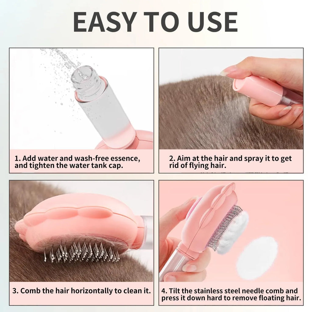 Grey spray cat brush with a release button and stainless steel bristles on a white background.