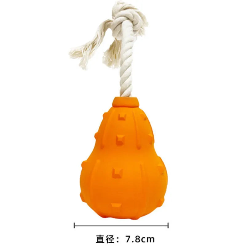 Natural rubber stuffable dog toy for small medium breeds on a green background