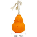 Natural rubber stuffable dog toy for small medium breeds on a green background