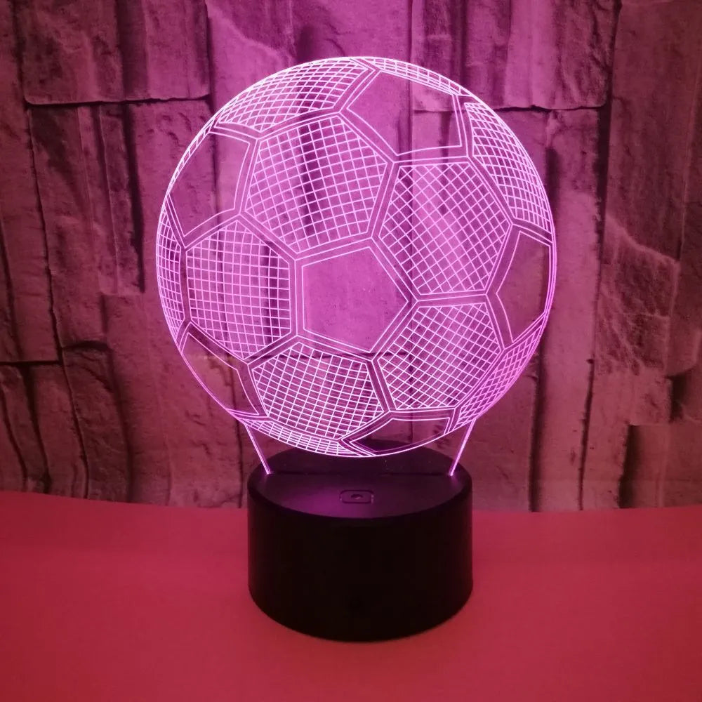 3D football night light with acrylic panel on ABS base, showing colourful projection.