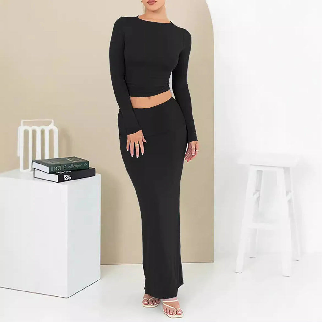 Women's black polyester two-piece suit with three-quarter sleeve top and long skirt, sweet style.