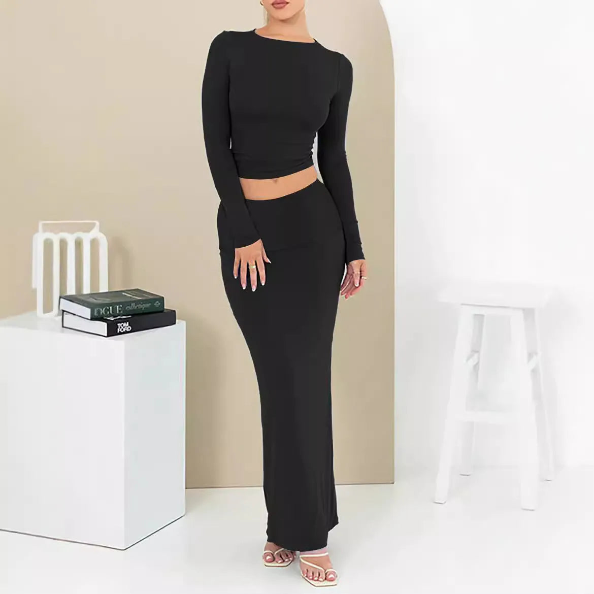 Women's black polyester two-piece suit with three-quarter sleeve top and long skirt, sweet style.