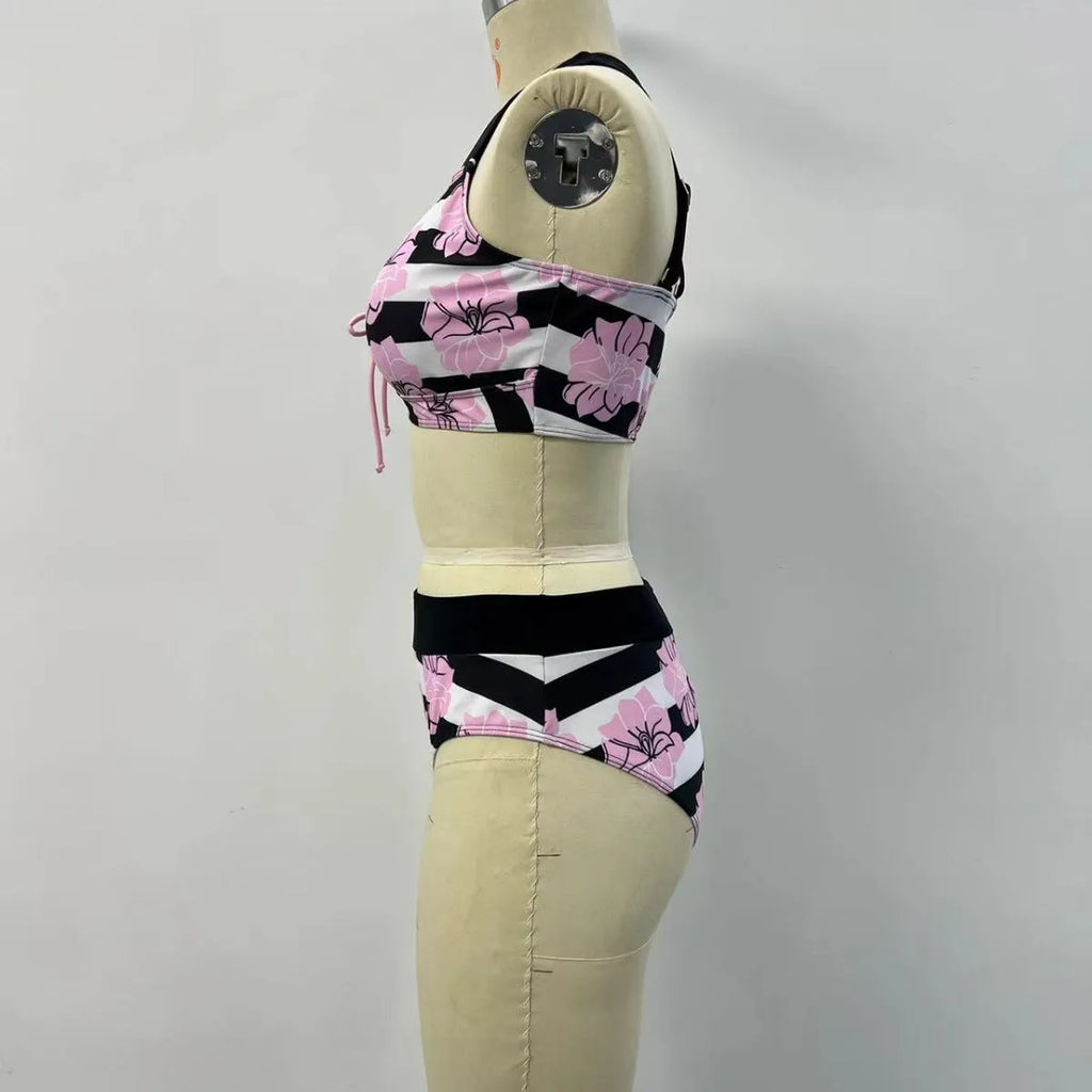 Black women's split bikini with belly coverage design for swimming