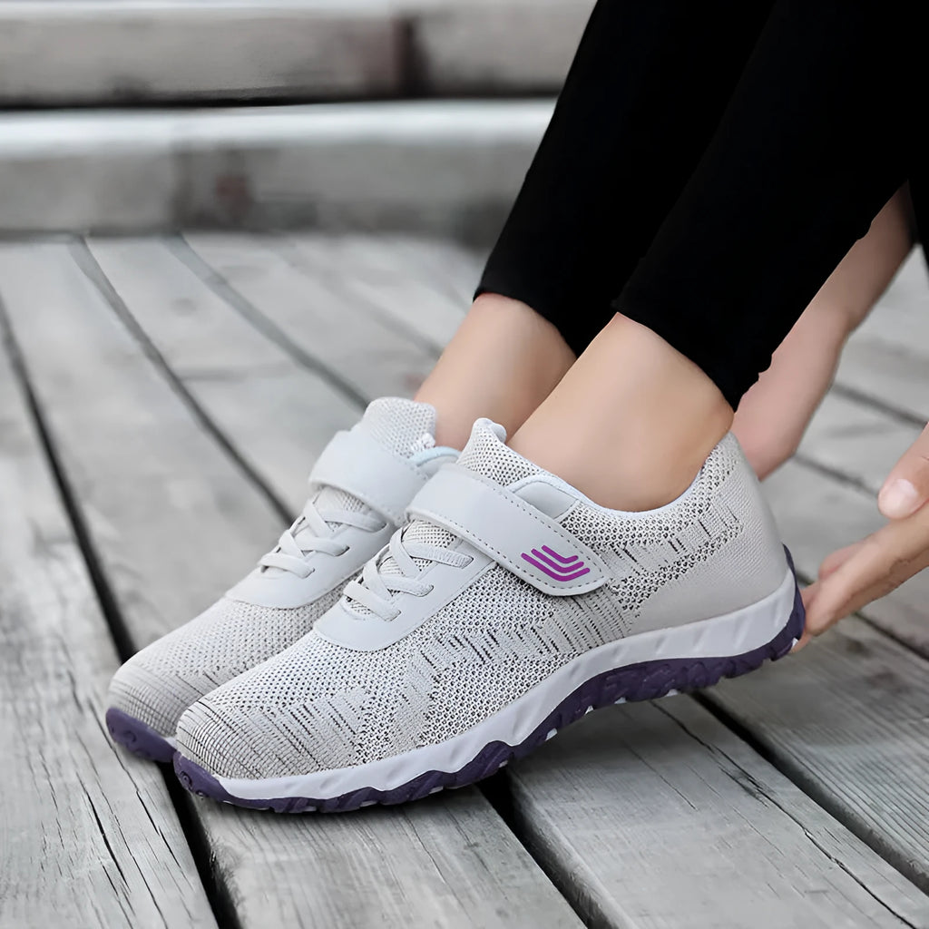 Women's grey purple wedge heel shoes with mesh upper and Velcro strap fastener.