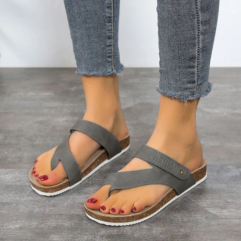 Flat toe ring thick-soled flip-flops in a solid colour with an artificial PU upper and foam sole.