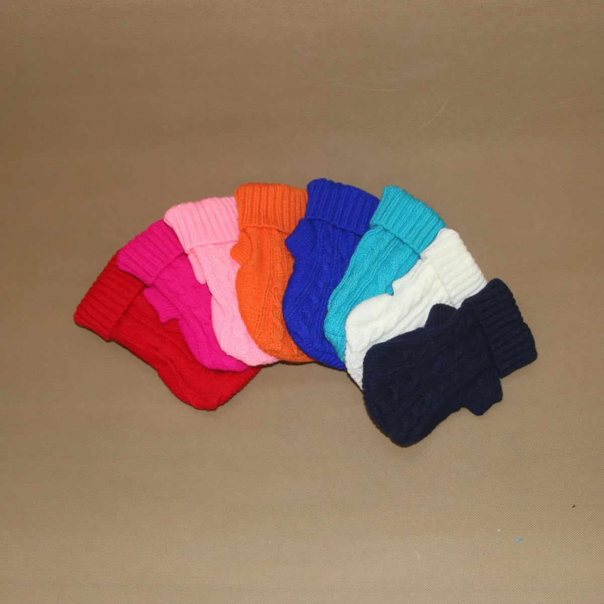 Knitted wool dog sweater with fabric buttons, available in eight colours and sizes XS to XXL
