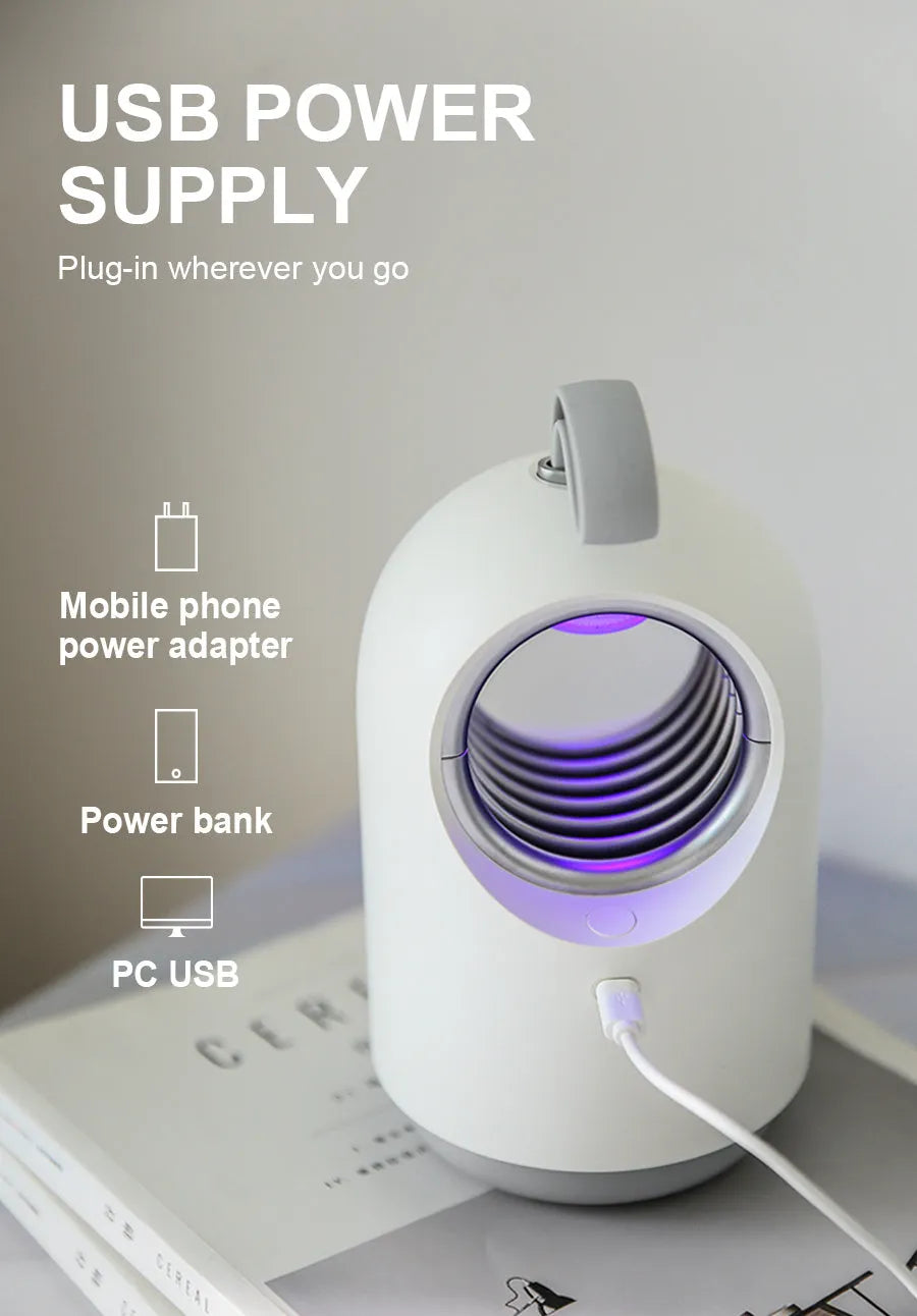 Blue and white indoor mosquito killer lamp with UV light and silicone carry handle for rooms up to 20 square metres