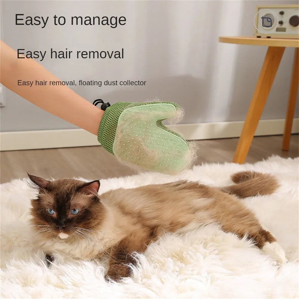 A dark blue mesh pet grooming glove for removing hair from dogs and cats.