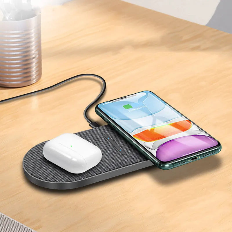 Black wireless charging pad pair showing two flat charging surfaces with indicator lights
