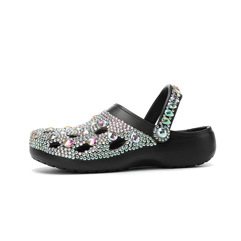 Black platform sandals for women with rhinestone detail on an EVA upper and sole.