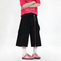 Retro denim wide-leg cropped trousers with multiple pockets, shown in red and black colour options.