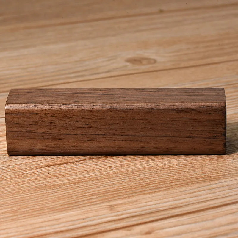 Brown walnut wood portable power bank with aluminium shell and charging port