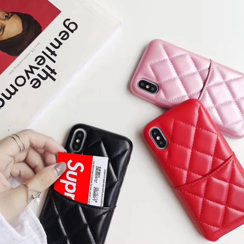Black leather mobile phone case for iPhone XS Max on a table