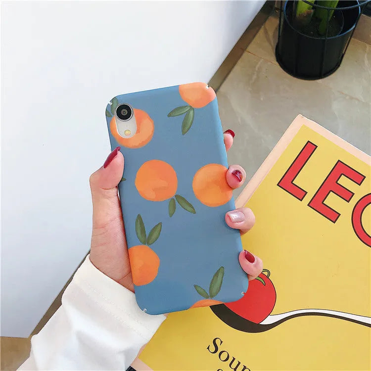Orange retro plastic iPhone case with water and blue background design, shown as a back cover.