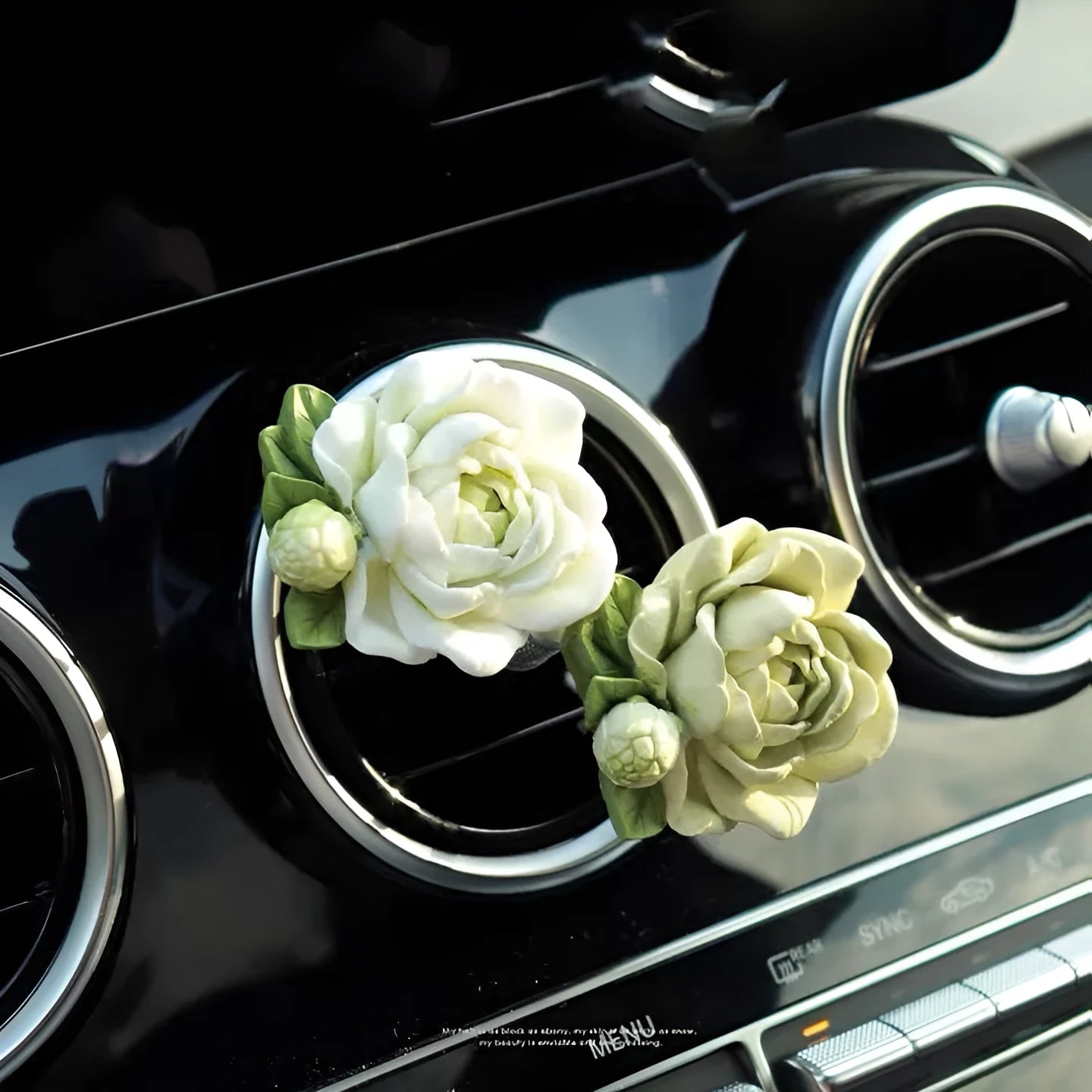Jasmine car perfume solid air outlet freshener in off white or fresh green colour on car vent
