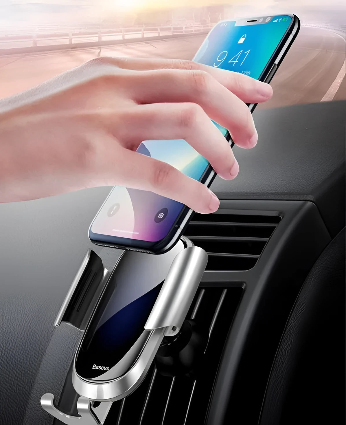Universal adjustable car bracket smartphone holder in black, mounted on a car dashboard.