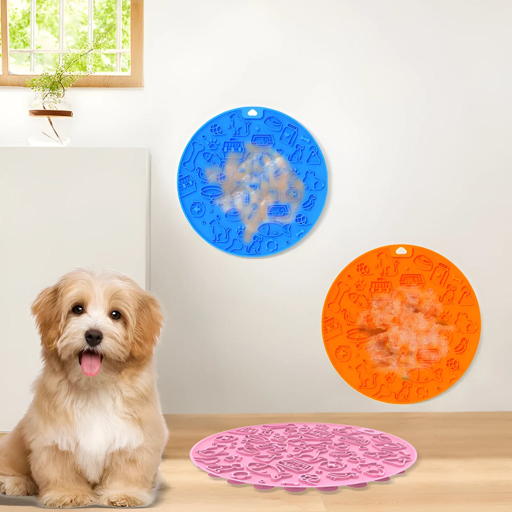 Round blue silicone pet licking mat with textured surface and a suction cup on the base.