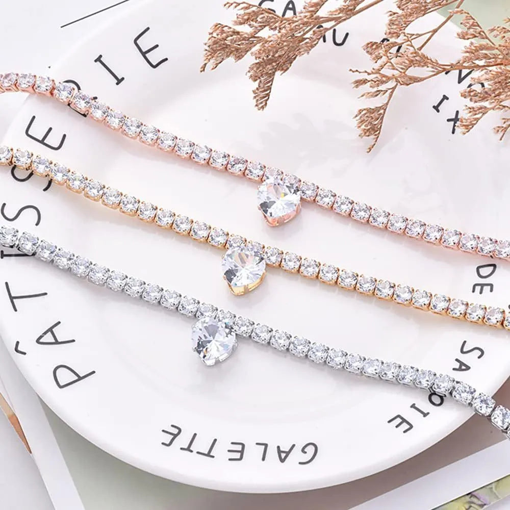 Gold rhinestone heart-shaped decorative collar for dogs and cats with extension chain.