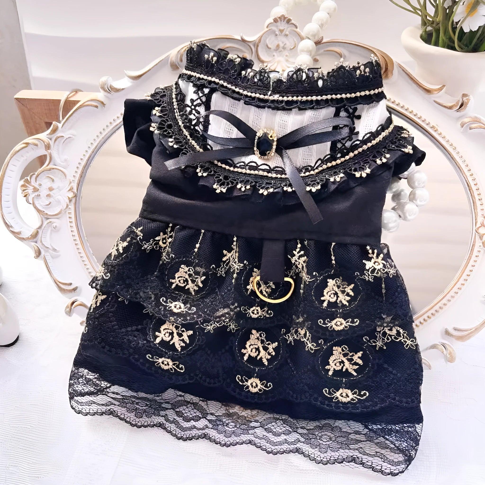 Golden Gothic princess style skirt costume for a small dog or cat on a mannequin.