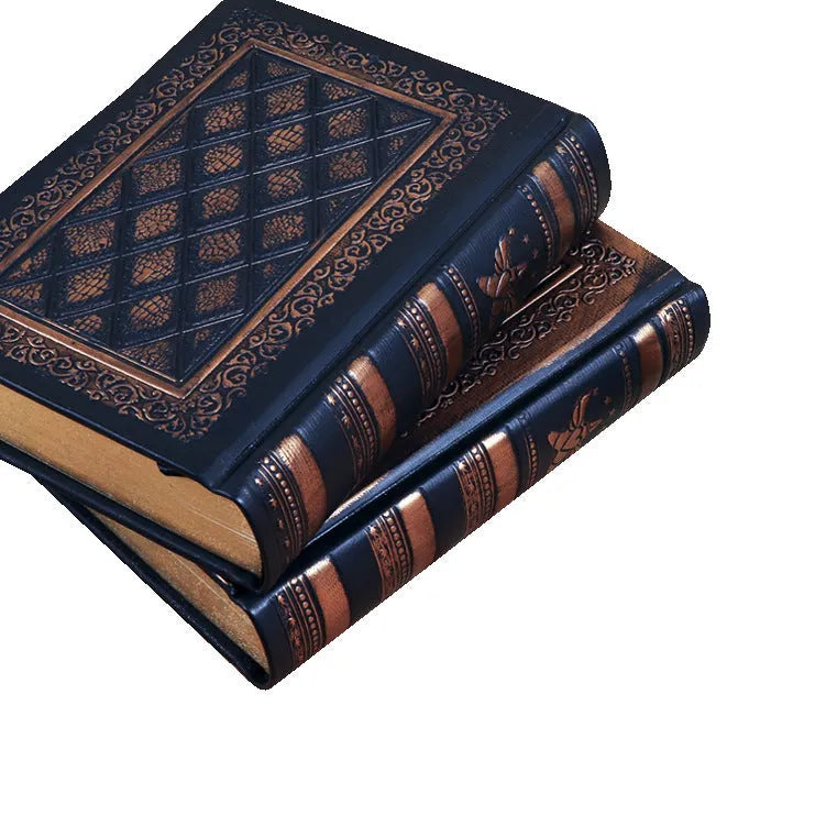 Bronze embossed faux leather A5 notepad with 192 thick unlined pages, lying open.
