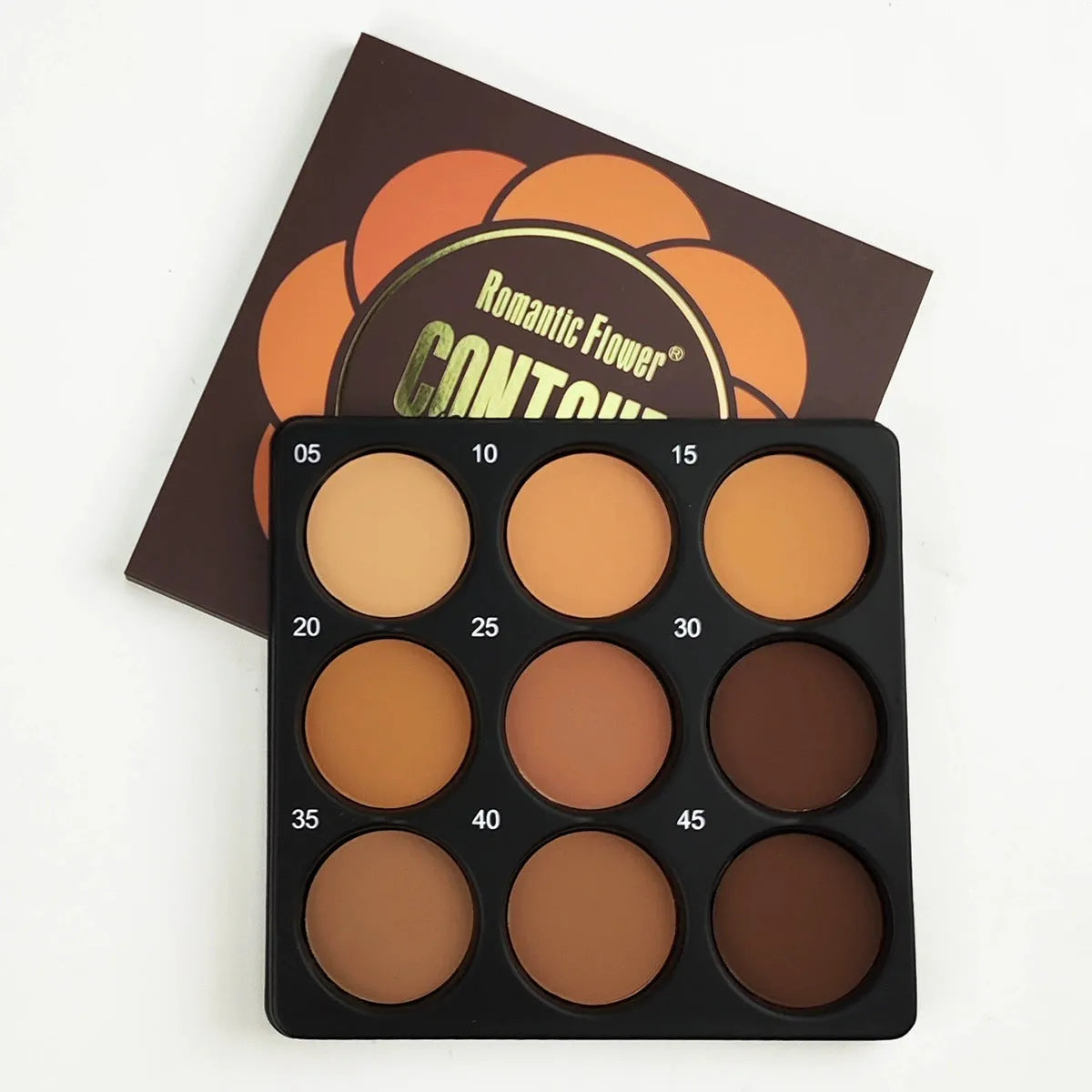 Dark matte 9-colour waterproof makeup palette compact open showing colour pans