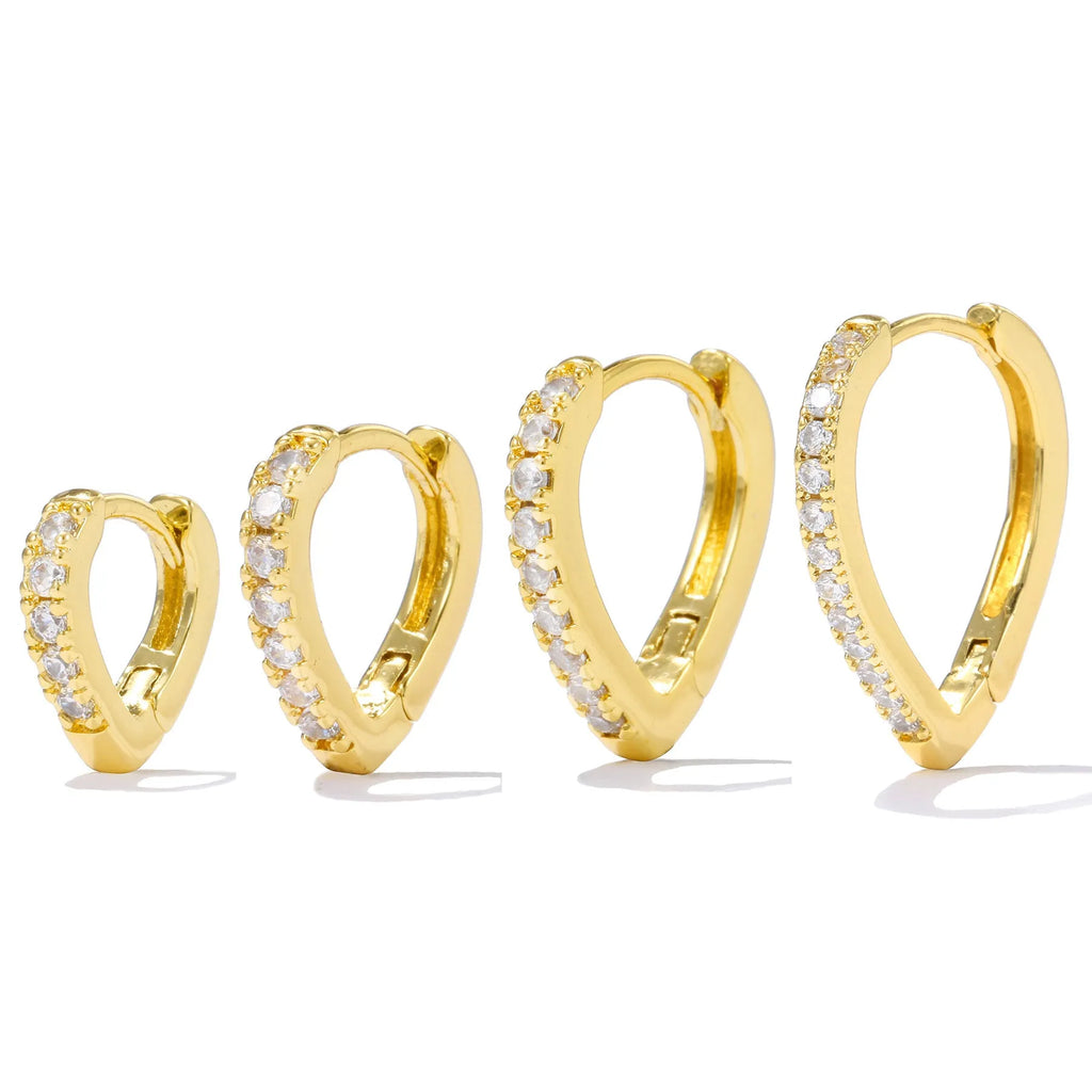 Geometric heart-shaped ear clip in gold and white colours with copper construction and electroplated finish