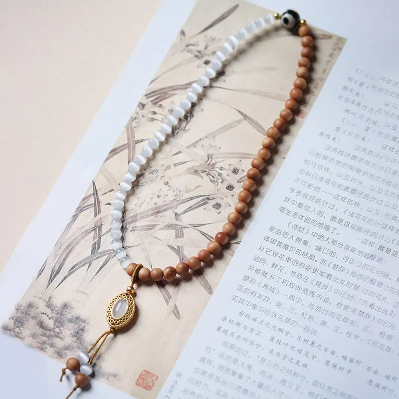 Retro unisex bracelet with sandalwood opal Tibetan beads and mixed material construction
