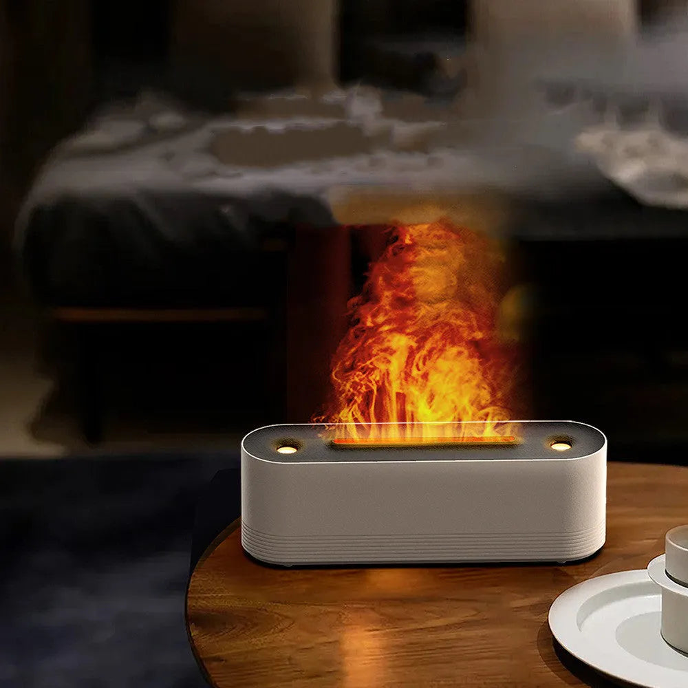 Black Flame Air ultrasonic humidifier and essential oil diffuser with coloured LED lights on a desk.